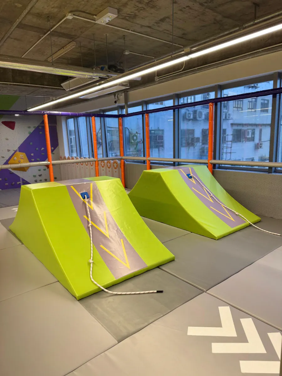 Netted ninja run obstacles in the open play area at MosKiddo